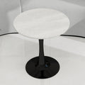 Table basse ronde effet marbre dans un salon