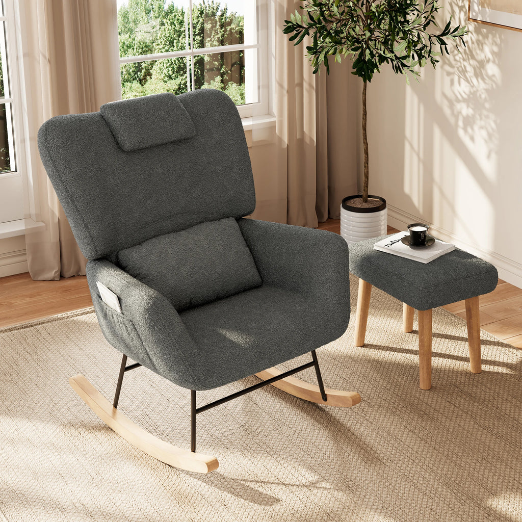 Fauteuil d'allaitement gris dans une chambre de bébé