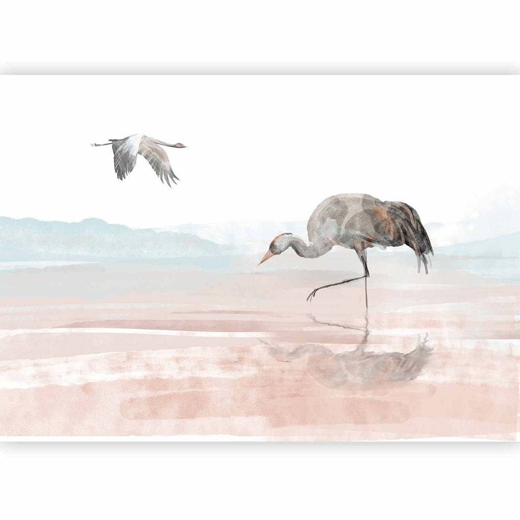 Grues au bord de l'eau posées dans une chambre